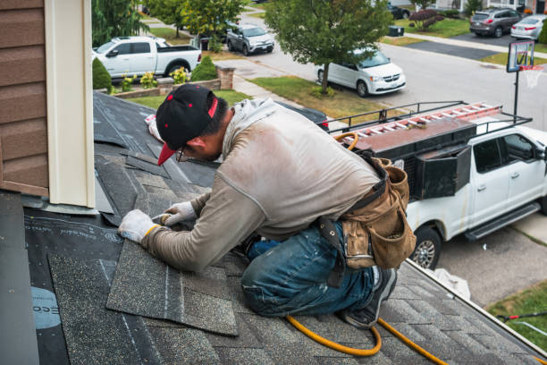 Professional Roofing technician working in California, MD